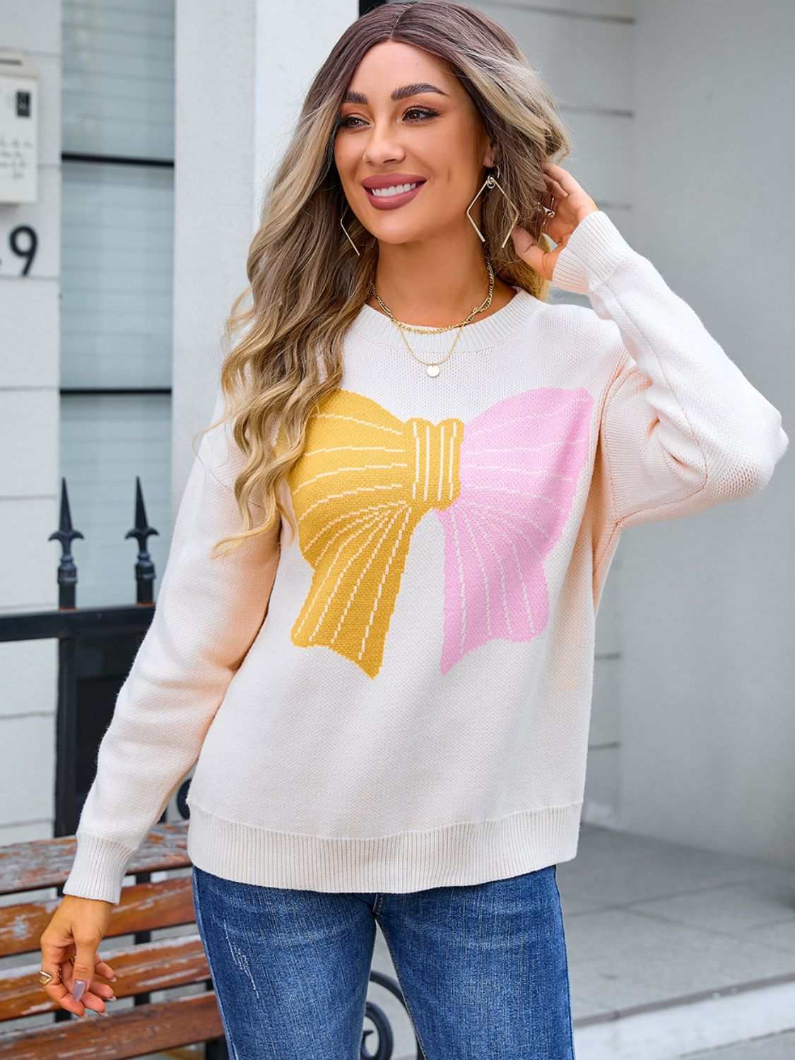 Angel Wings Bow Round Neck Dropped Shoulder Sweater with colorful bow design.