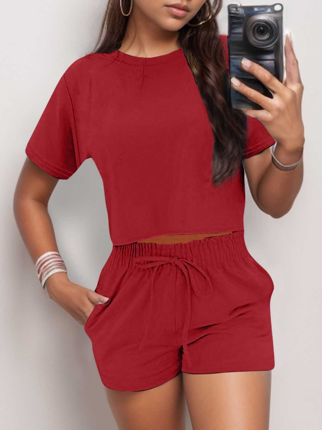 Full Size Round Neck Short Sleeve Top and Shorts Set in red with pockets and tie detail.