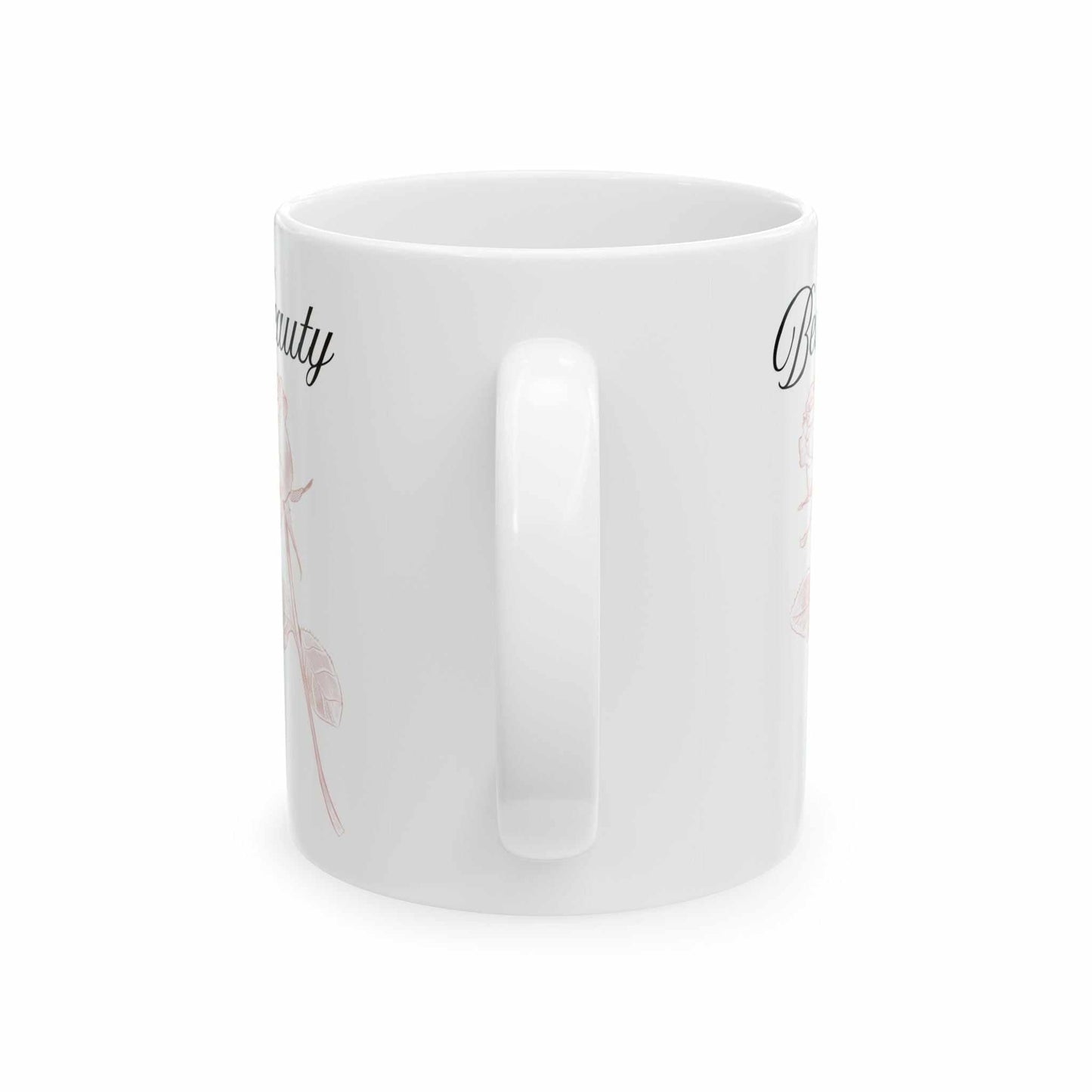 Ceramic mug with 'Beauty' text and dusty rose design, glossy finish.