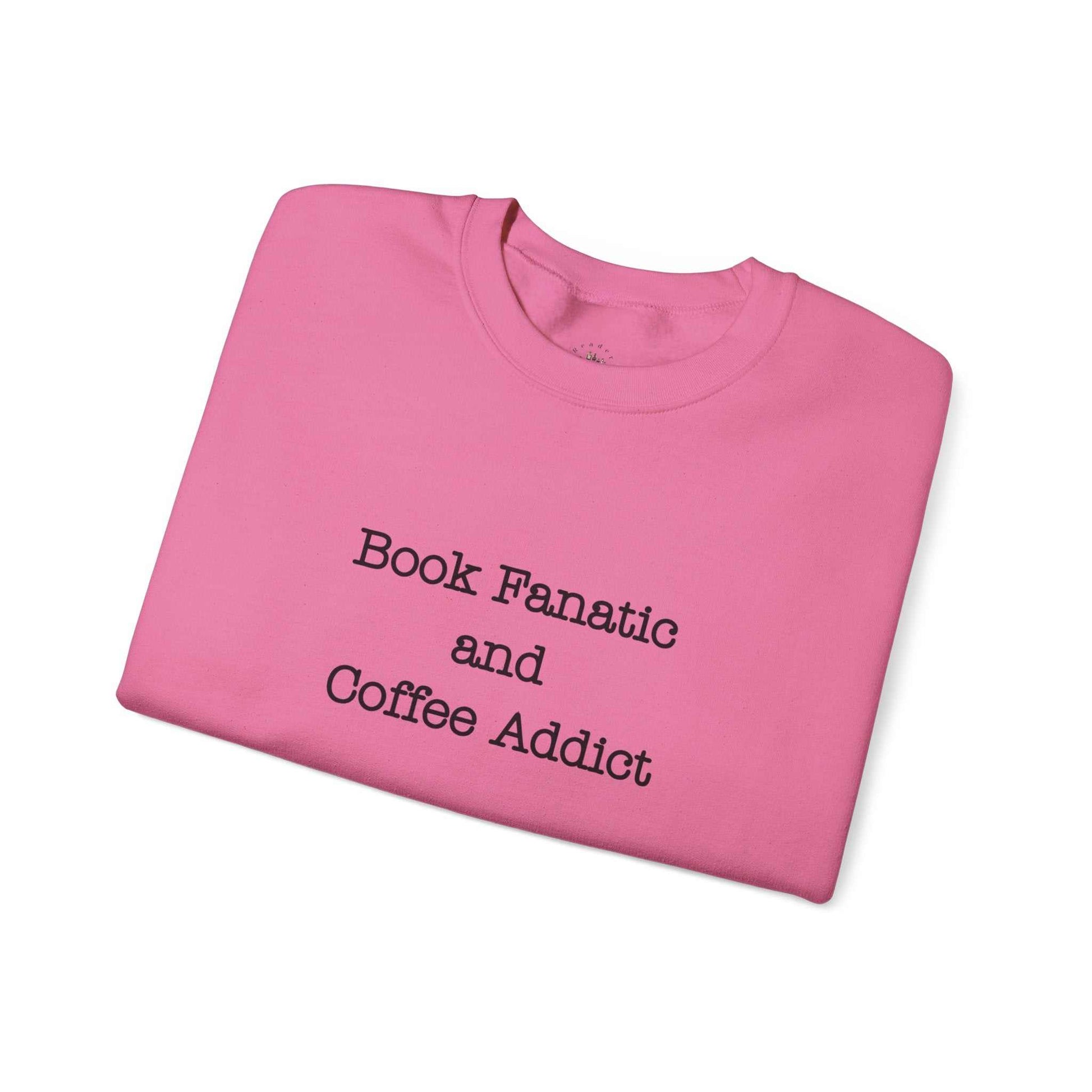 Pink crewneck sweatshirt with "Book Fanatic and Coffee Addict" text on sleeve, ideal for unisex book and coffee lovers.