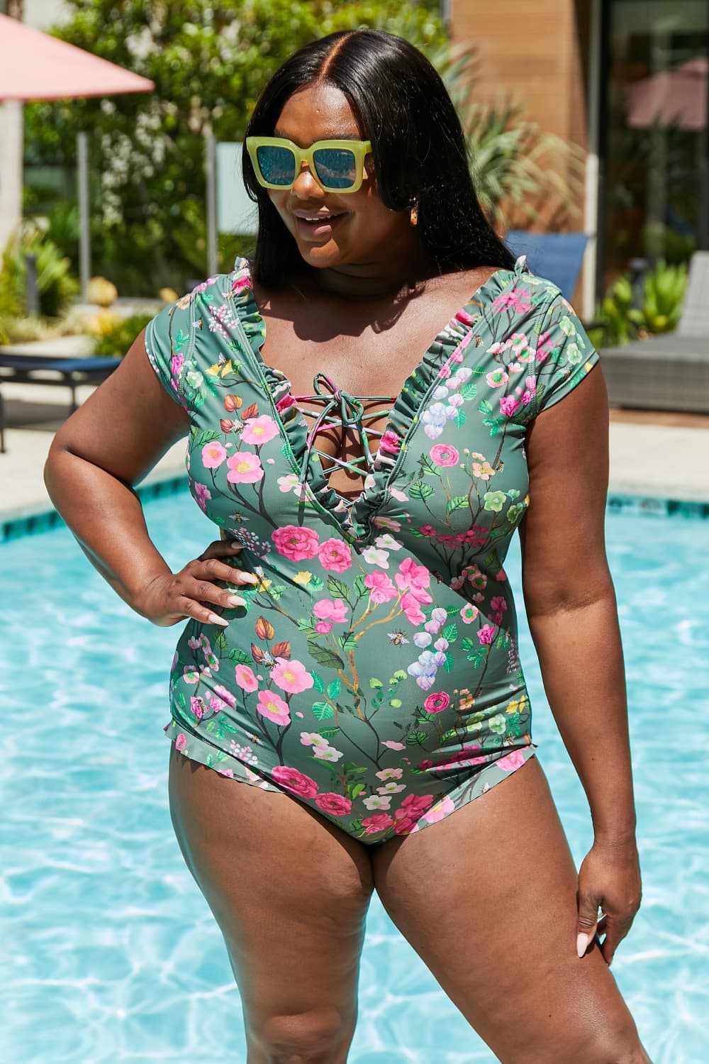 Sage floral V-neck one-piece swimsuit with lace-up detail by Marina West Swim.