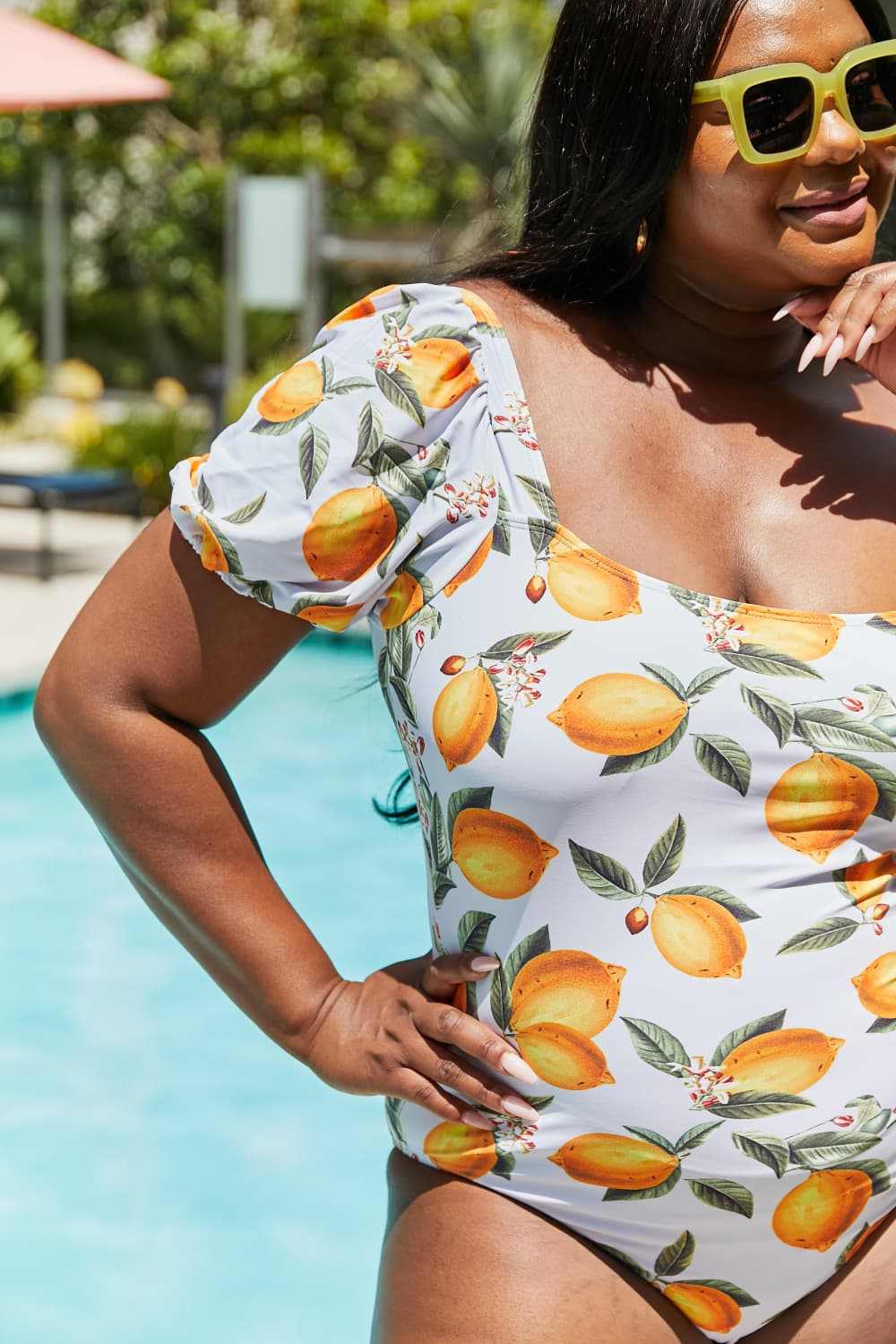 Cottage-core one-piece swimsuit with citrus print and puff sleeves by Marina West Swim.