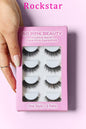 SO PINK BEAUTY Faux Mink Eyelashes 5 Pairs in packaging with a hand holding the box against a pink background.