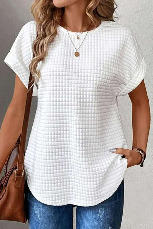 Round neck short sleeve t-shirt in white, slightly stretchy polyester blend.