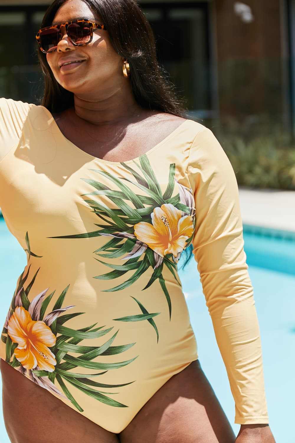 Marina West Swim Cool Down Longsleeve One-Piece Swimsuit in yellow with floral print, providing sun protection and style.