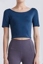 Cutout backless round neck active t-shirt with short sleeves in blue.