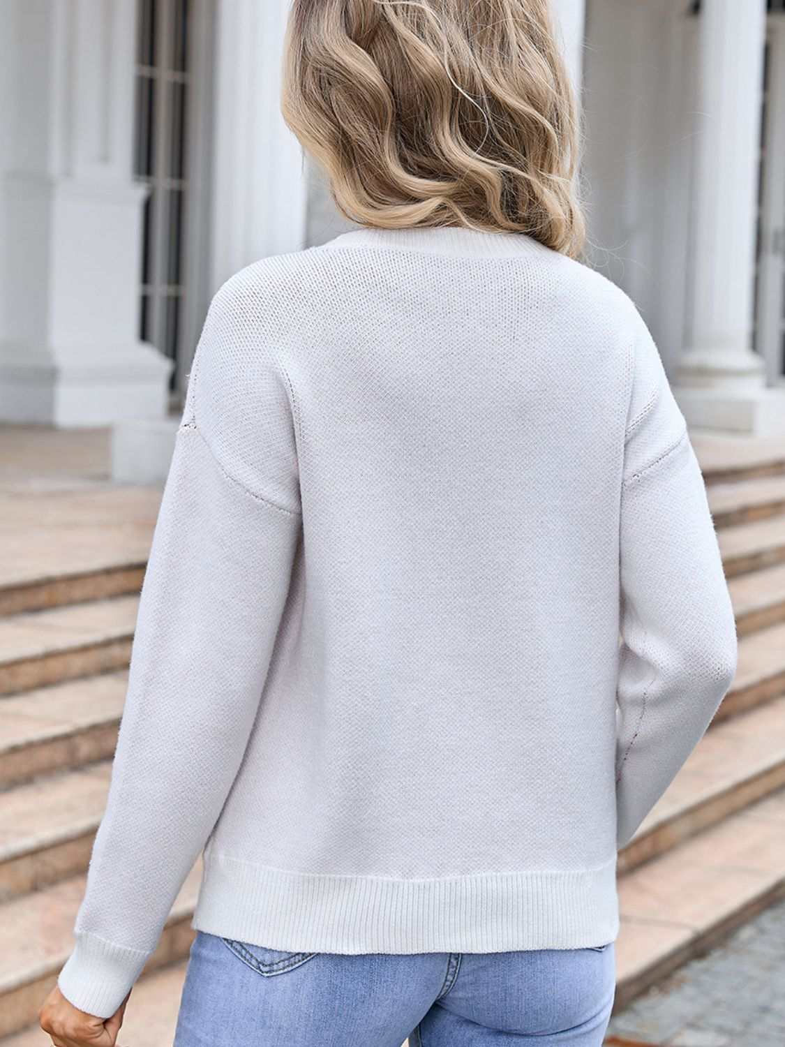 Angel Wings Bow Round Neck Dropped Shoulder Sweater in white, back view.