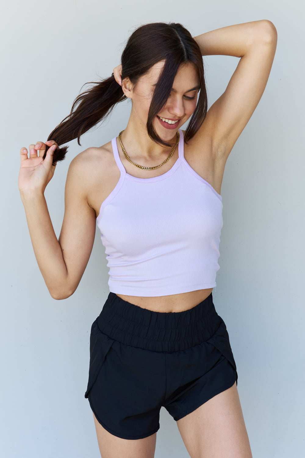 Lavender ribbed tank top with short straps, made from soft modal fabric, perfect for casual chic style.