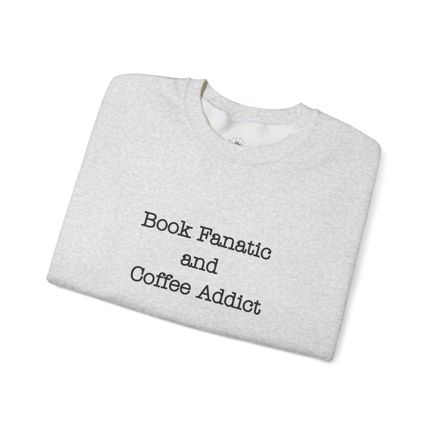 Crewneck sweatshirt with "Book Fanatic and Coffee Addict" text, unisex design, cozy fabric blend.