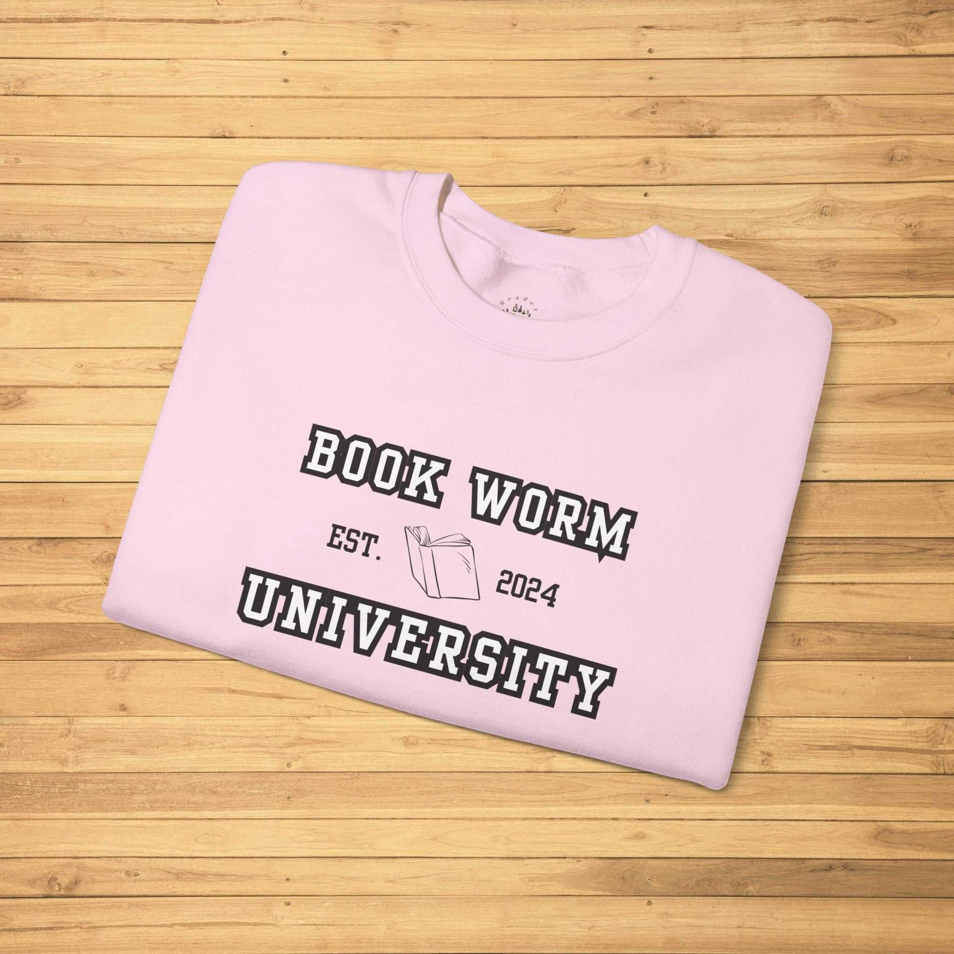 Bookworm University Crewneck Sweatshirt with Est 2024 Design on Pink Fabric