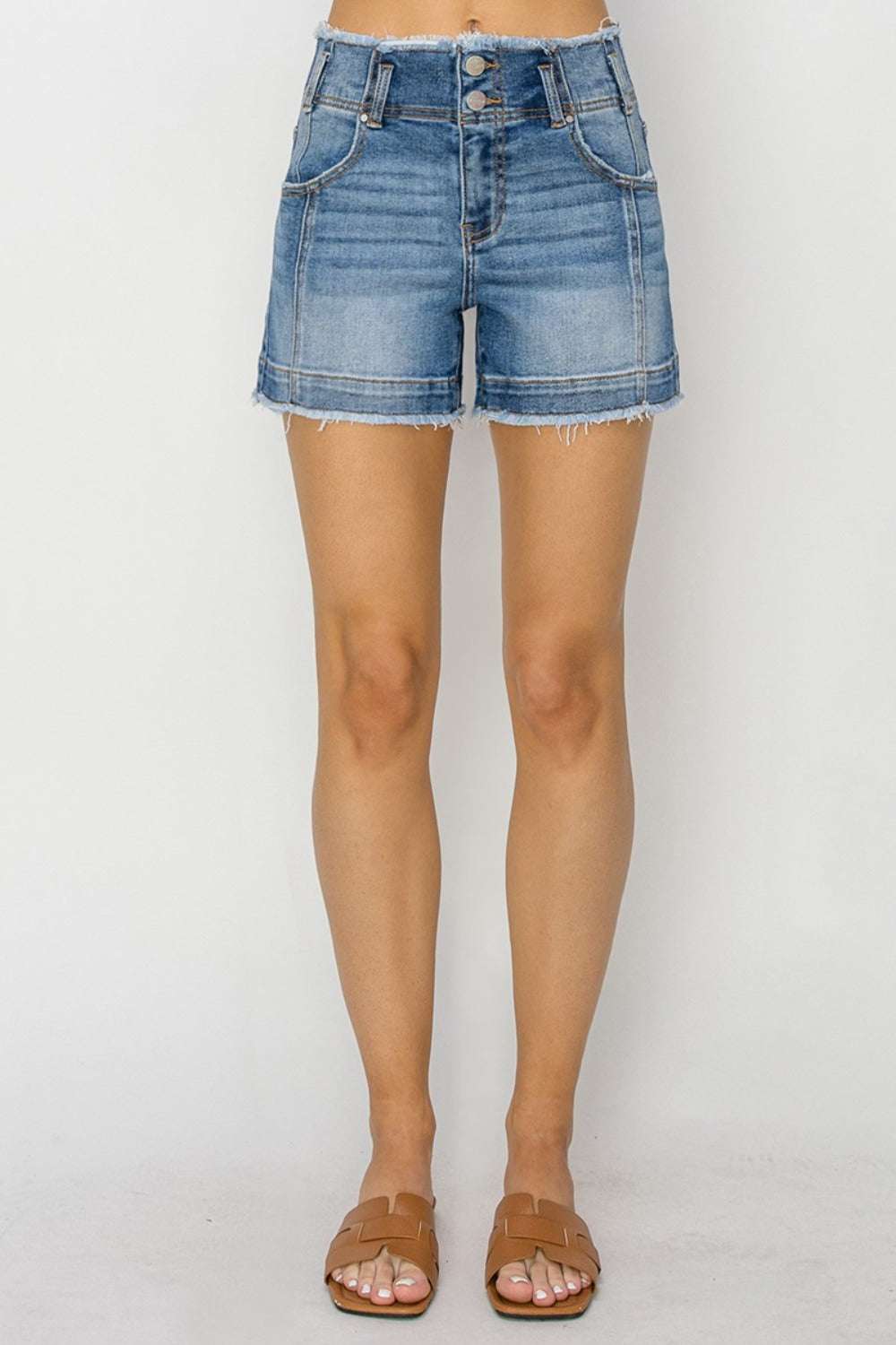 RISEN High Rise Seam Detailed Raw Edge Denim Shorts with pockets and raw hem.