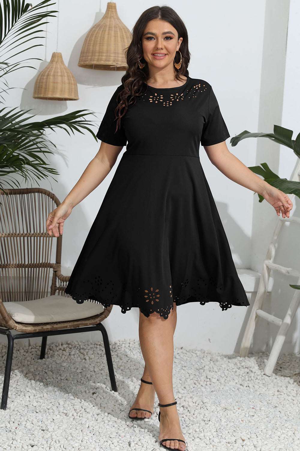 Plus Size Round Neck Openwork Dress in black with short sleeves.