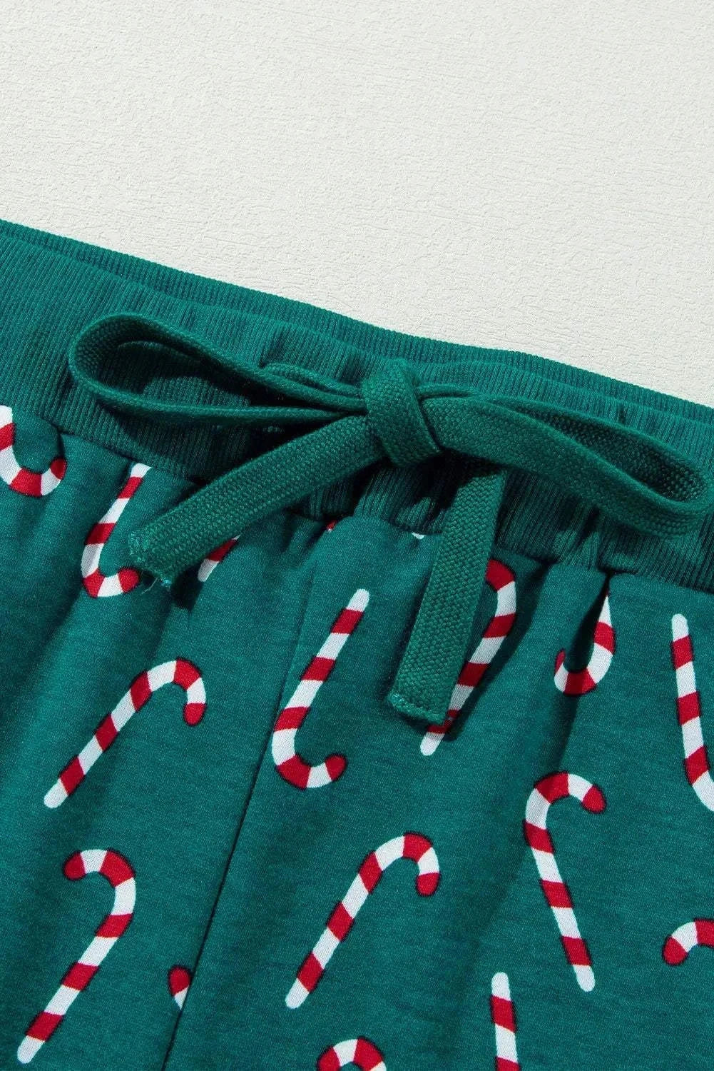 Candy Cane print lounge pants with drawstring.