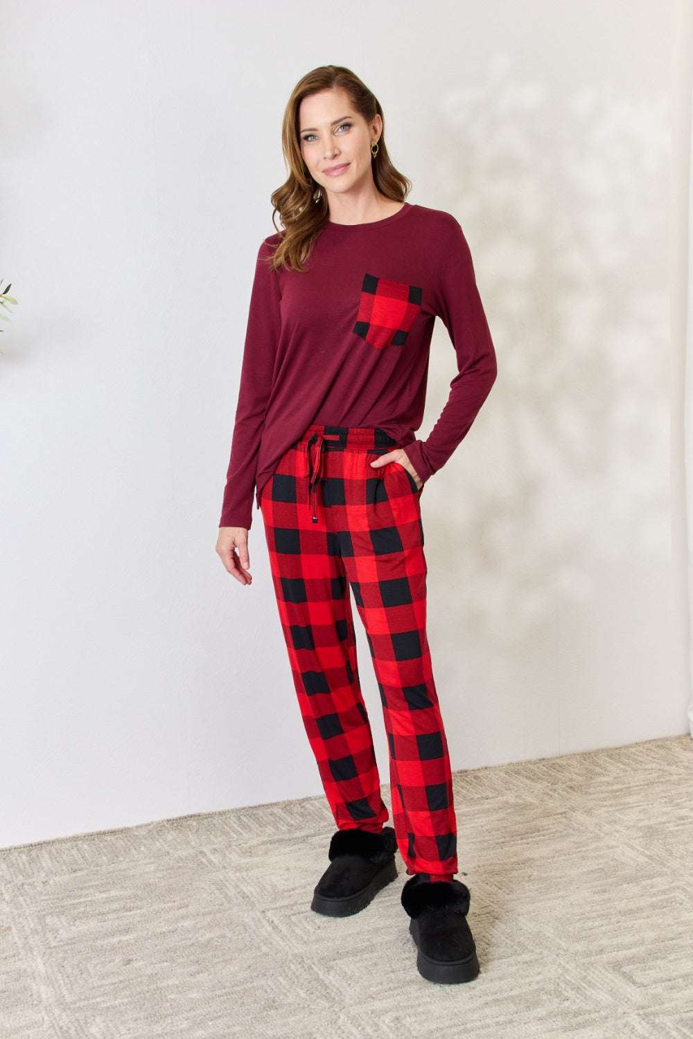 Zenana full size plaid round neck top and pants pajama set with front pocket and drawstring waist.