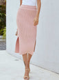 Ribbed side slit midi skirt in solid color, worn by a person.