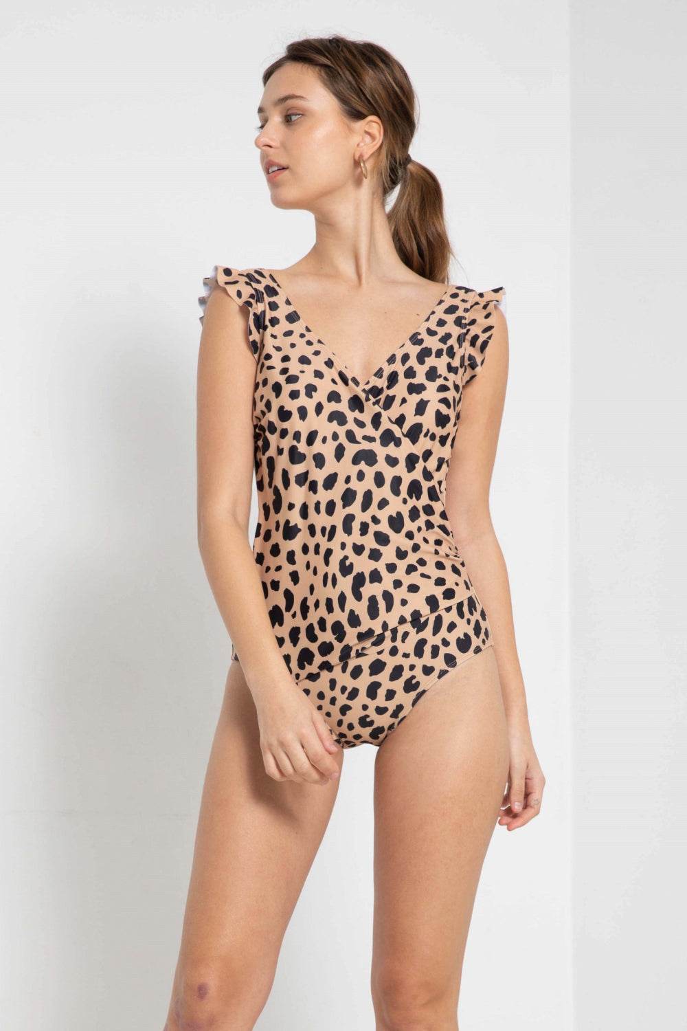 Marina West Swim leopard print ruffle faux wrap one-piece swimsuit.