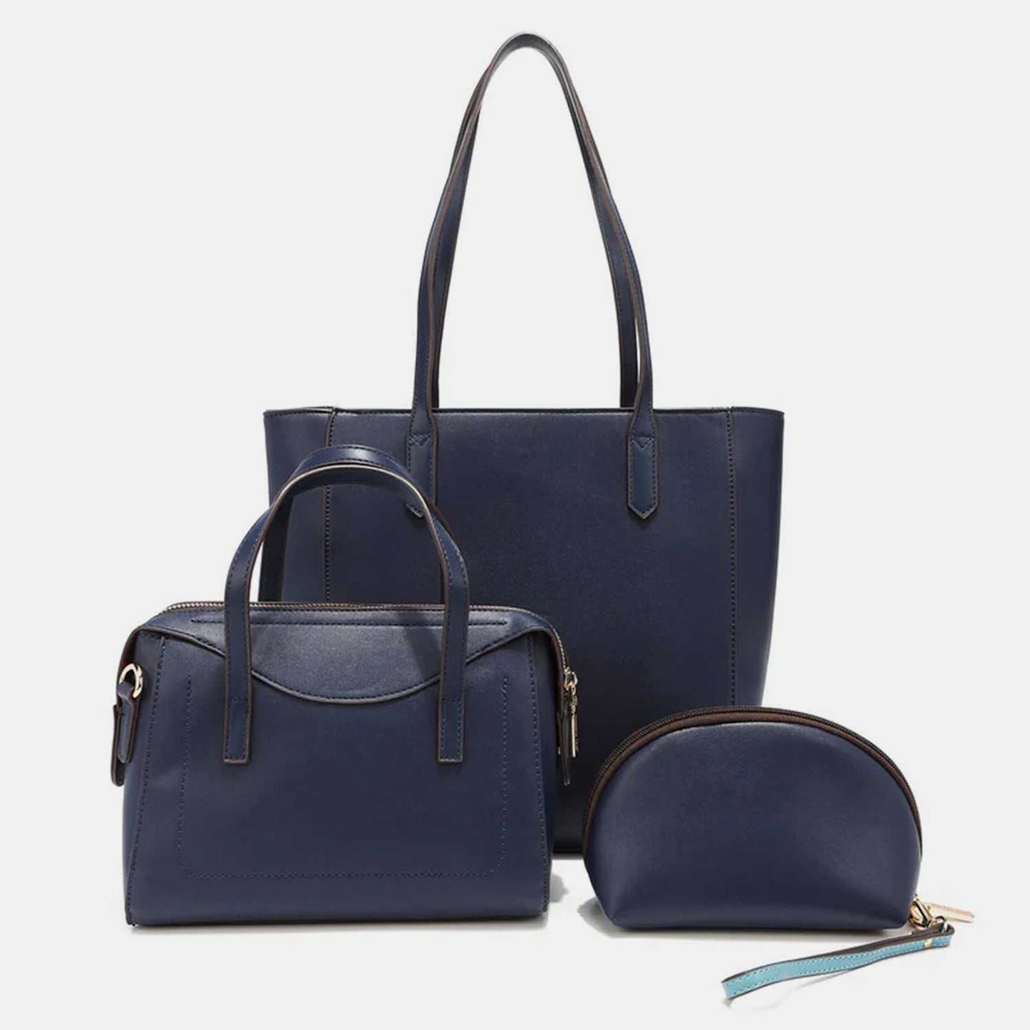 Nicole Lee USA 3-Piece Color Block Handbag Set featuring a large vegan leather shopper, mini crossbody bag, and pouch with wristlet.