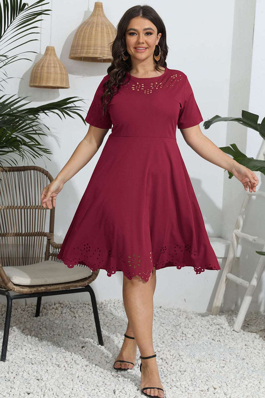 Plus size round neck openwork dress in burgundy with short sleeves and scalloped hem.