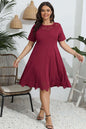 Plus size round neck openwork dress in burgundy with short sleeves and scalloped hem.