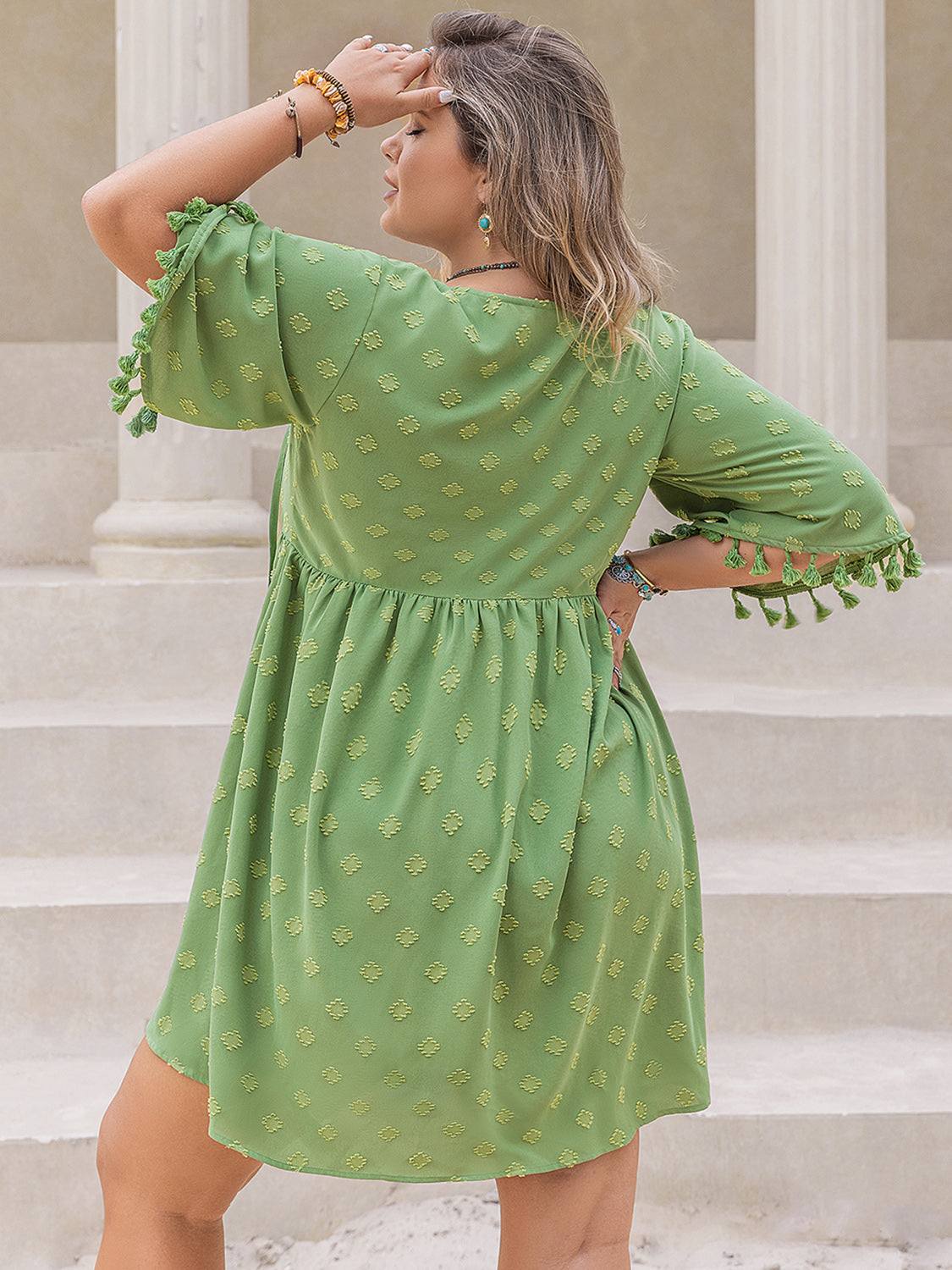 Plus size green tied tassel half sleeve mini dress in polyester.