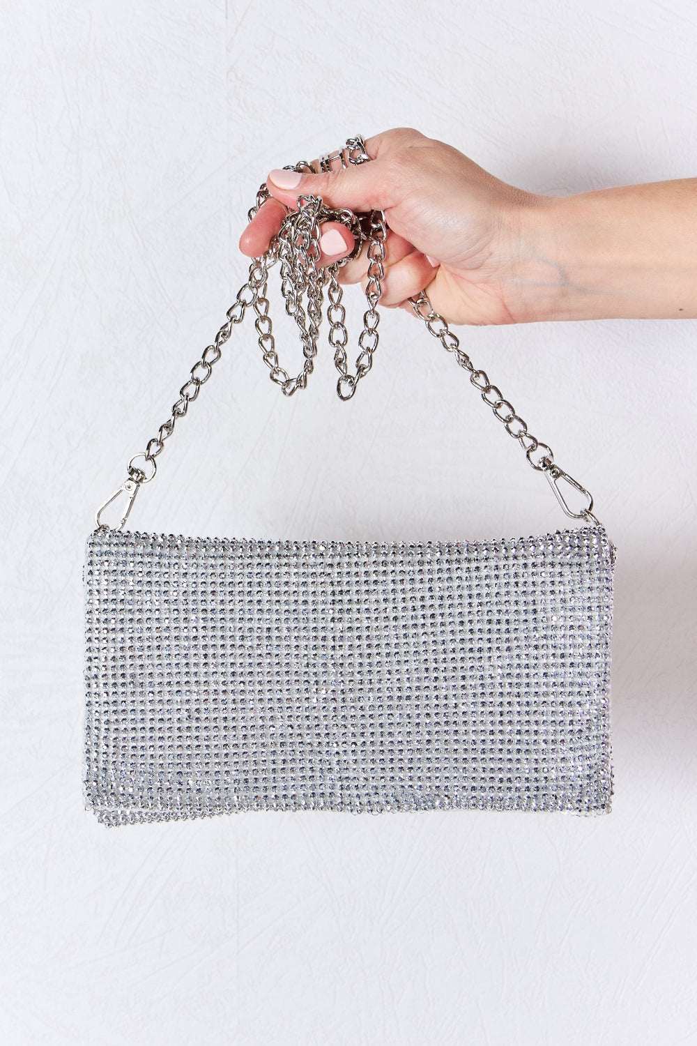 Small Forever Link Rhinestone Crossbody Bag with chain strap and sparkling embellishments.