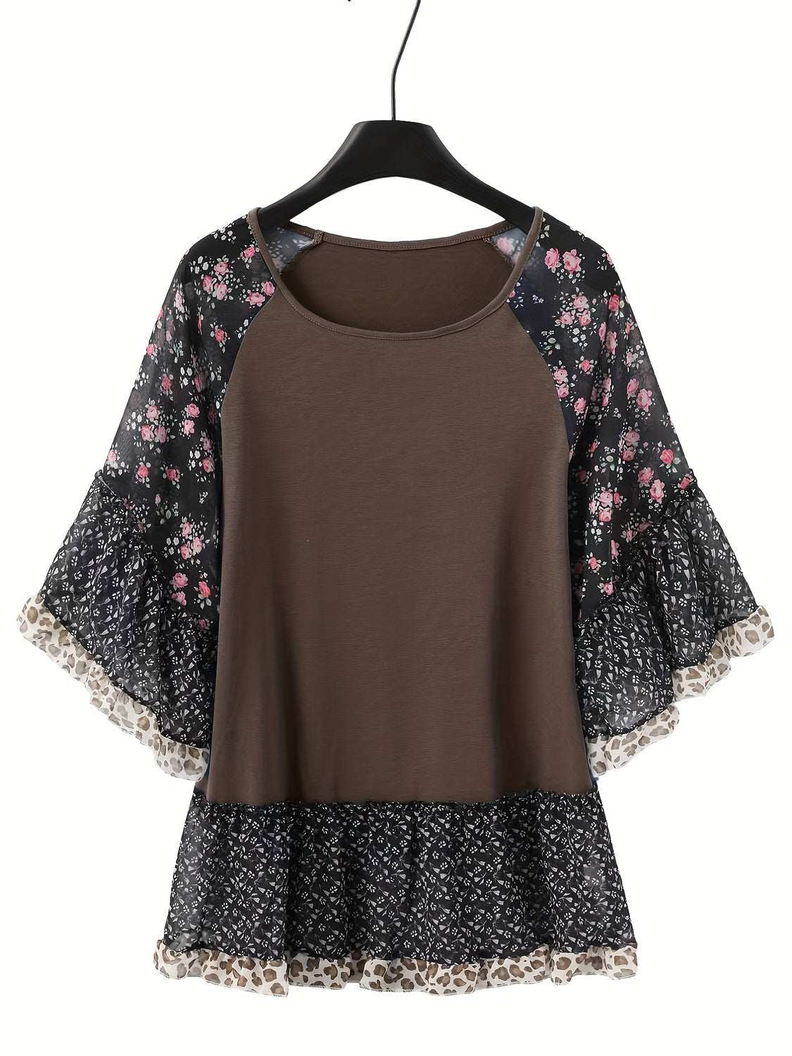 Full size frill printed round neck half sleeve blouse on hanger.