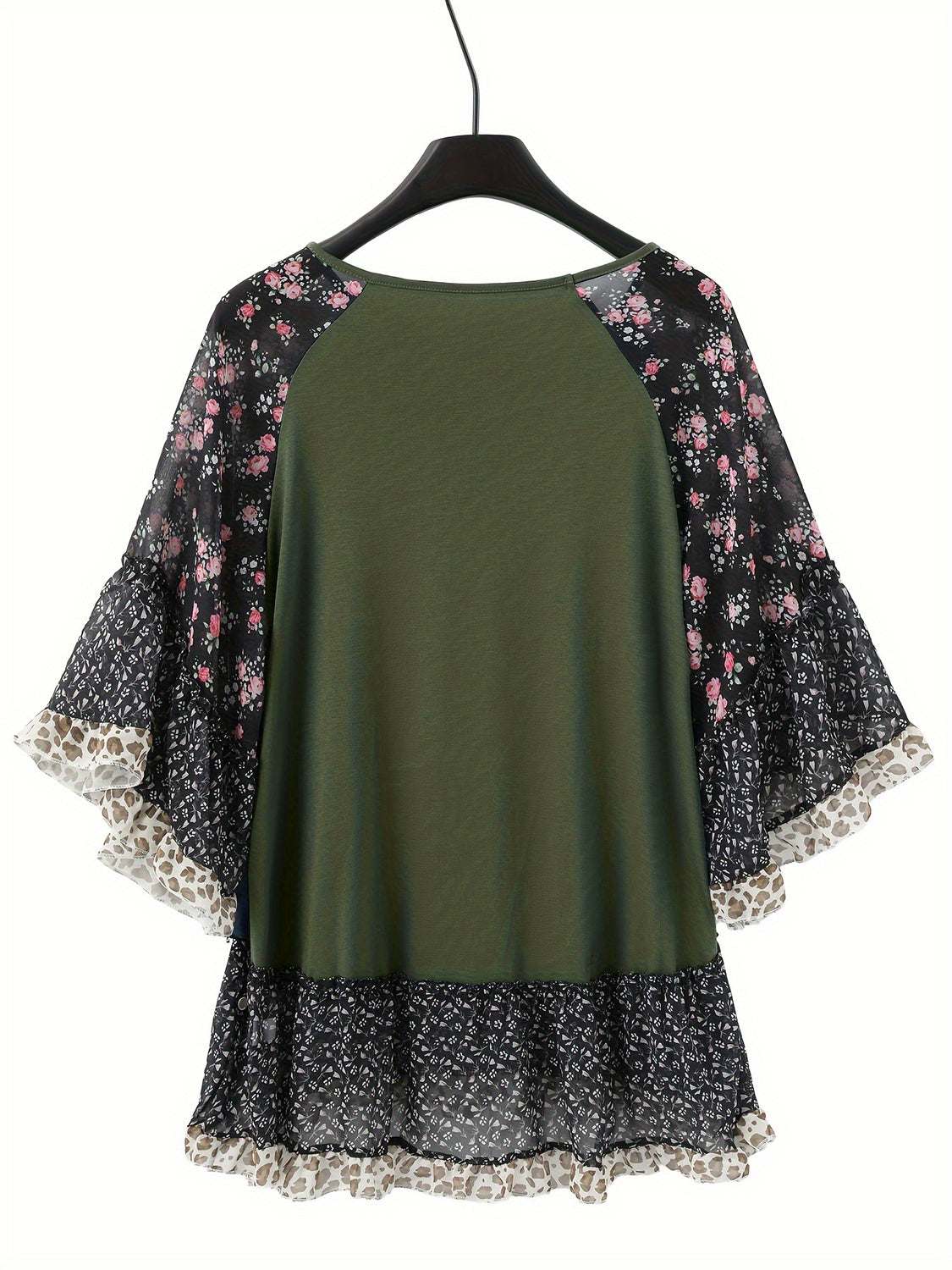 Full Size Frill Printed Round Neck Half Sleeve Blouse on hanger