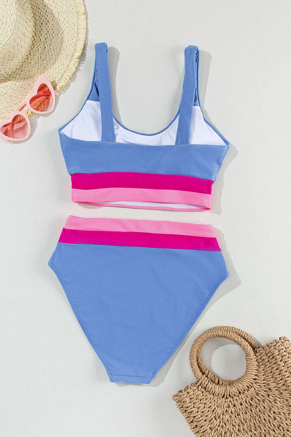 Contrast scoop neck two-piece swim set with removable padding in blue, pink, and white.