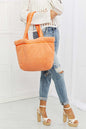 Orange Paradise Tote Bag made of soft polyester, large size with zip and slip pockets.