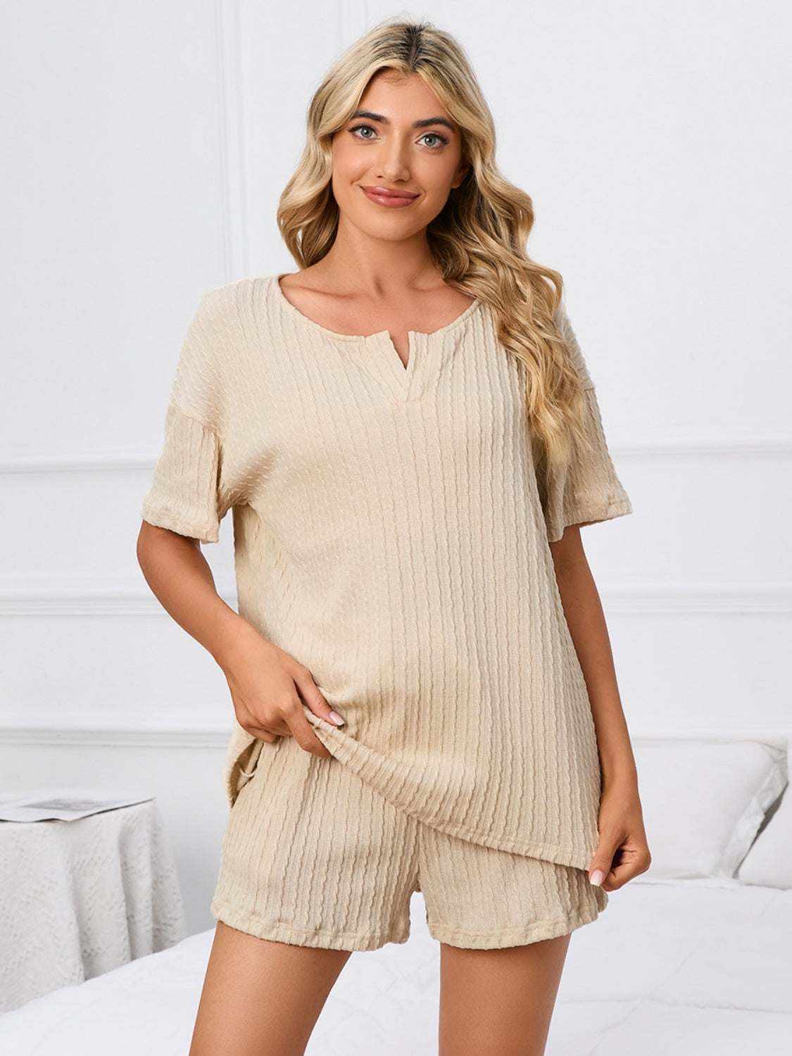 Notched short sleeve and shorts lounge set in beige, made from polyester and spandex, offering a basic style with slight stretch.