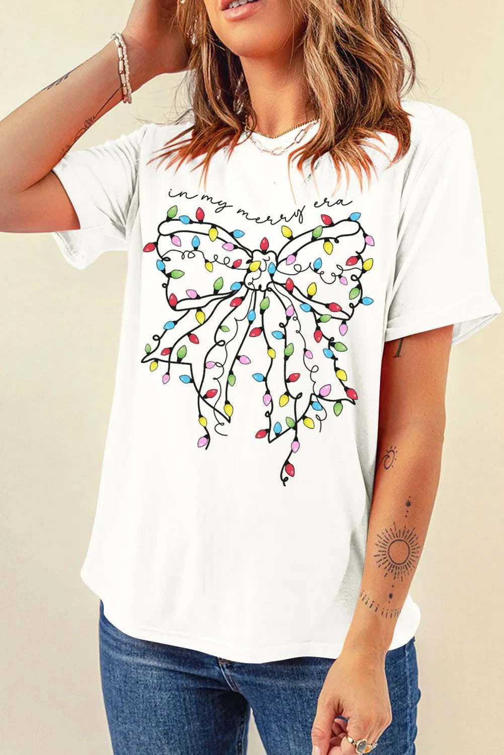 Full size bow round neck short sleeve t-shirt with colorful print design.