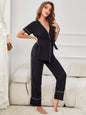 Contrast Piping Belted Top and Pants Pajama Set in black with surplice neckline and long sleeves, minimalist style.