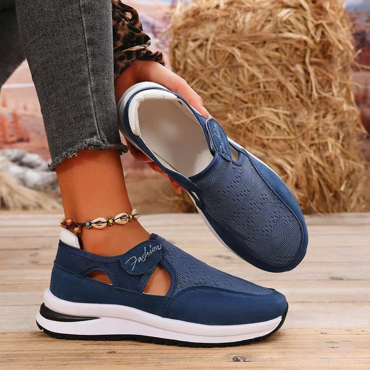 Mesh Round Toe Platform Sneakers in blue with mid heels and rubber sole.