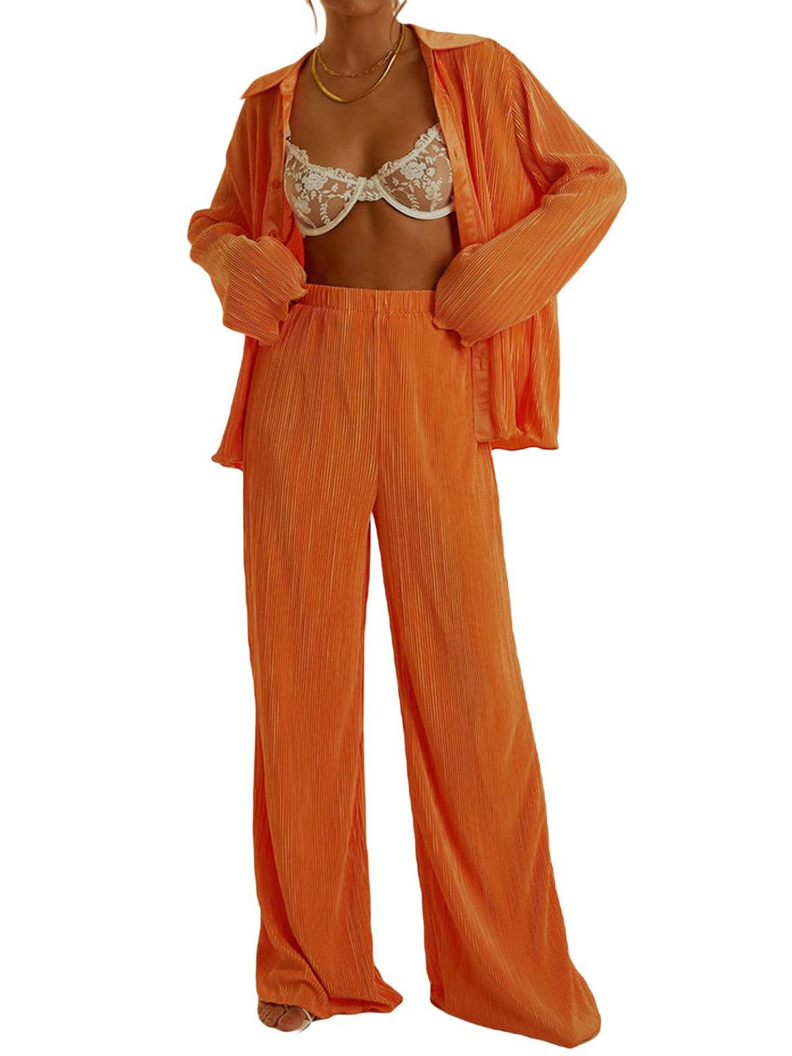 Collared neck long sleeve top and pants lounge set in orange, buttoned two-piece, 100% polyester.