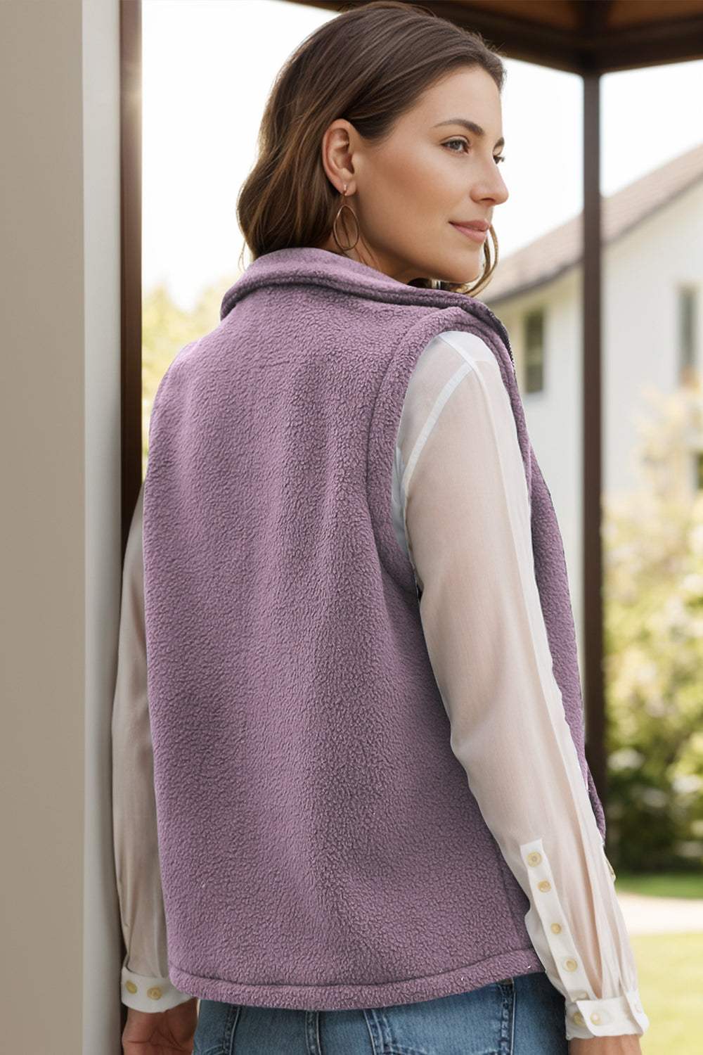 Purple zip-up vest coat with pockets, featuring a normal thickness and a blend of polyester and spandex.