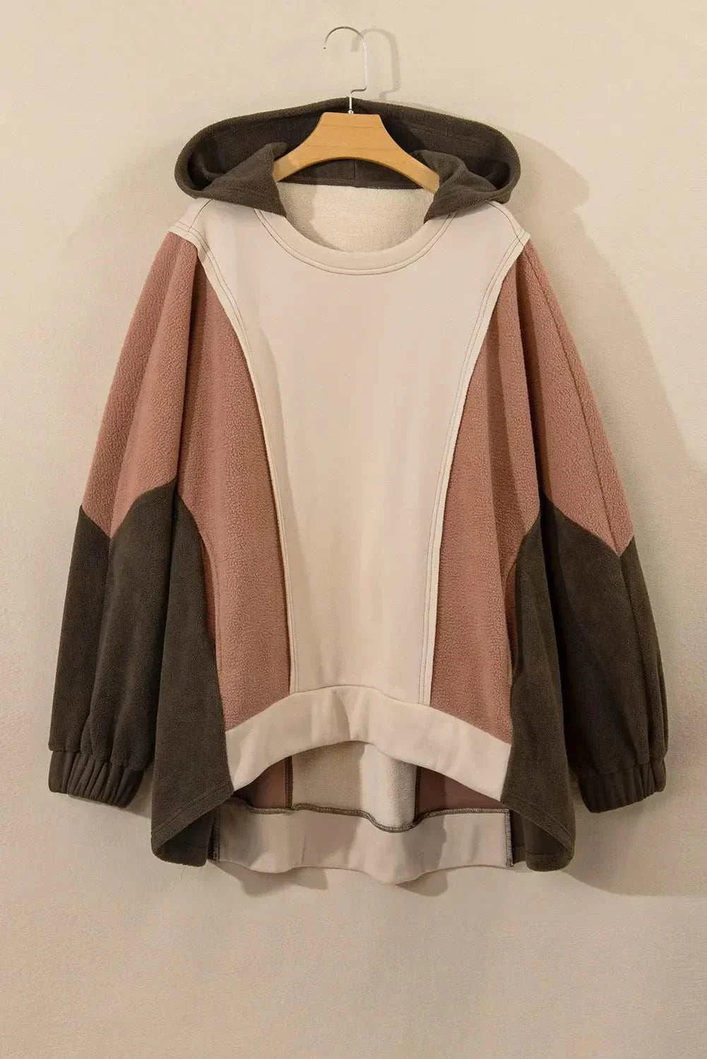 Plus size color block long sleeve hoodie in neutral tones.