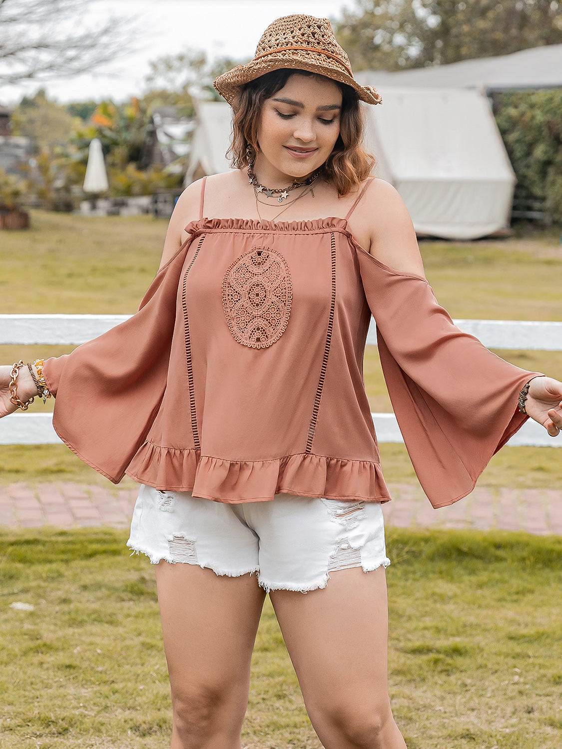 Plus size frill square neck long sleeve blouse in peach with ruffled hem.