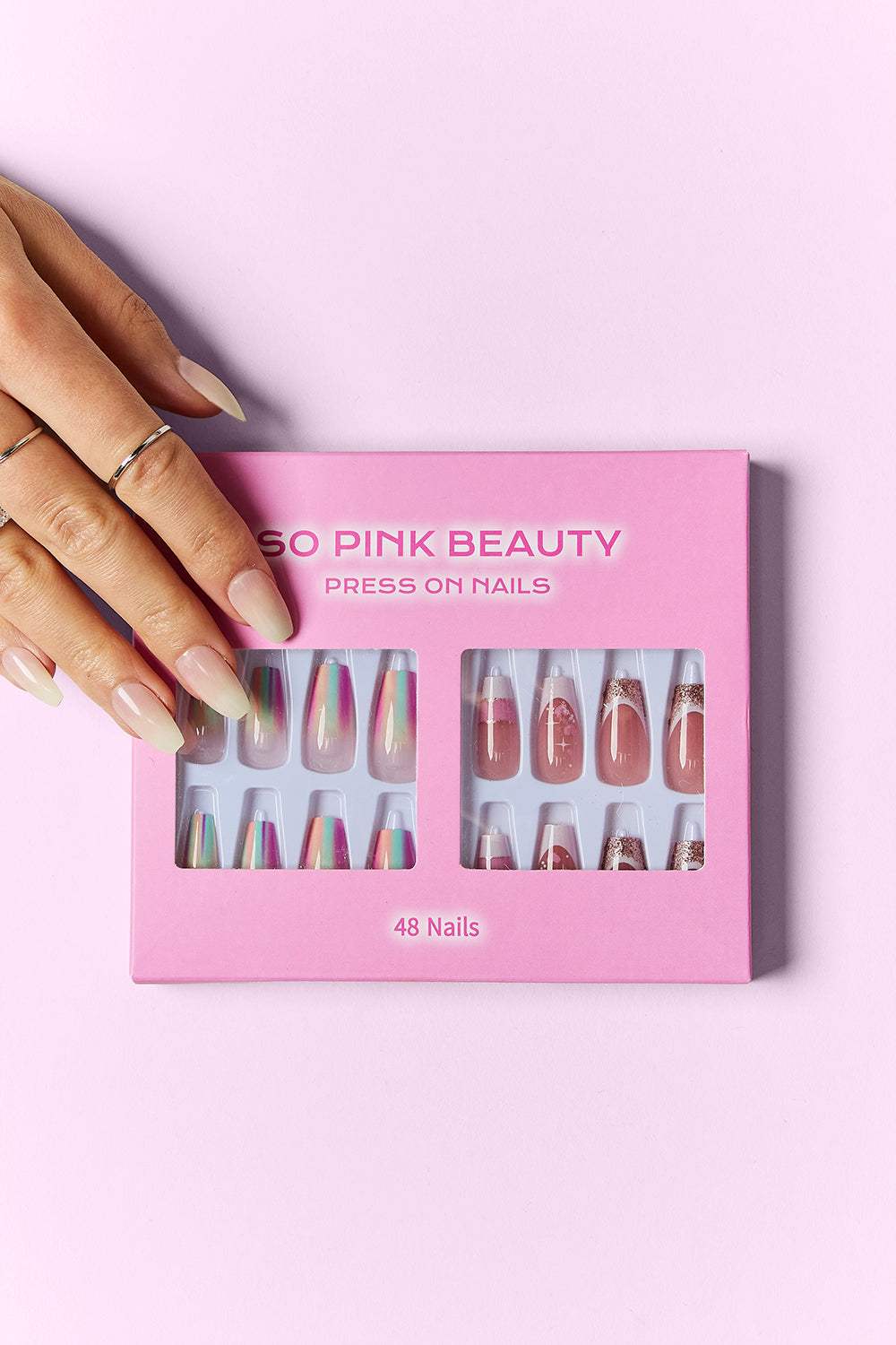 SO PINK BEAUTY Press On Nails 2 Packs with 48-piece set, featuring two distinct designs and included glue, perfect for a salon-worthy finish.