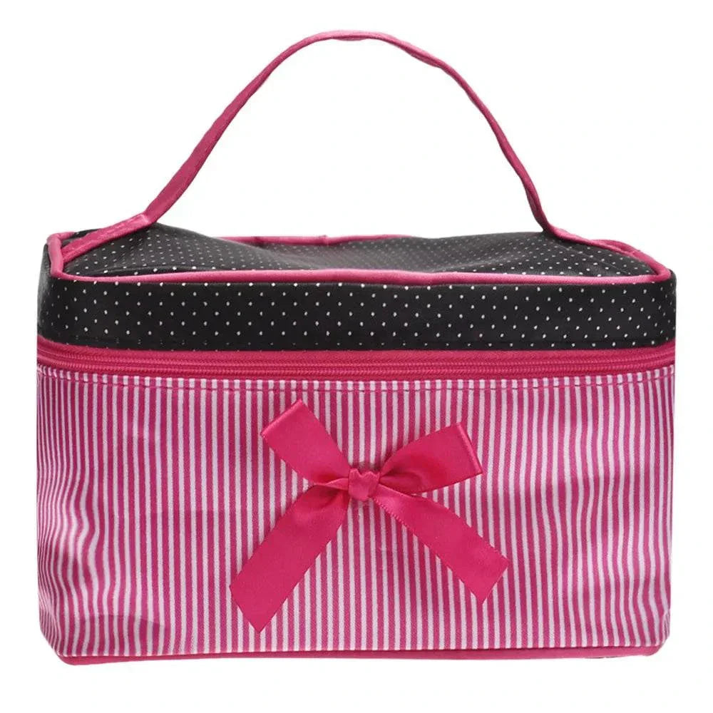 Striped pink and black travel makeup bag with bow, polyester, zipper closure.