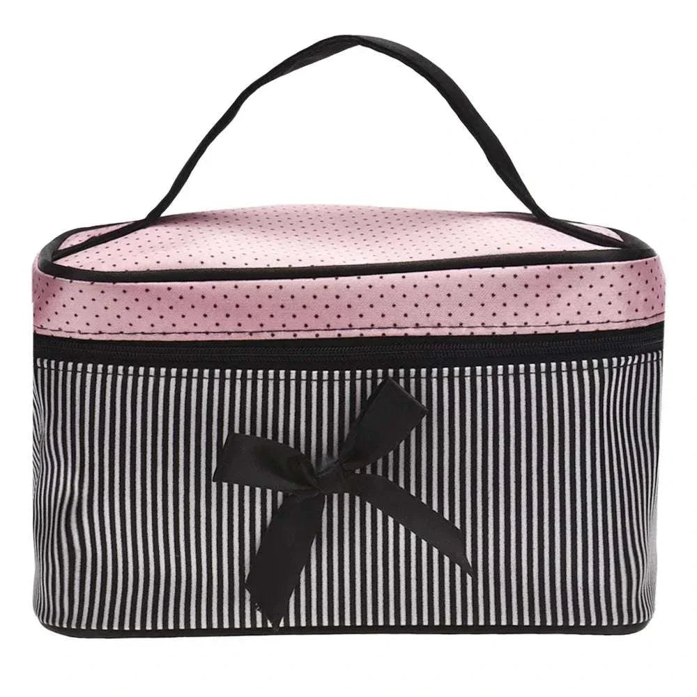 Striped travel makeup bag with bow, polyester material, zipper closure.