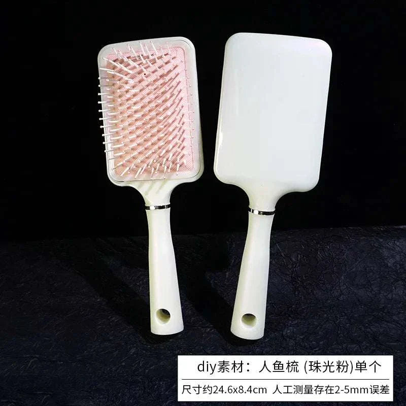 Portable airbag small comb mirror with DIY simulation cream glue materials for makeup.