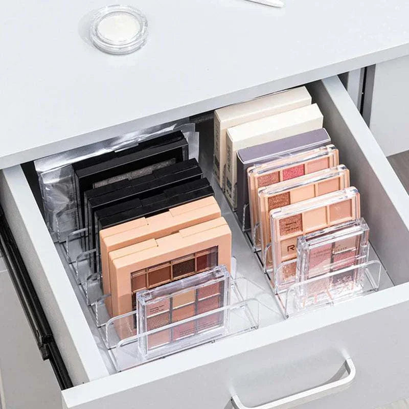 Makeup organizer desktop multi-cell display box with 7 compartments for cosmetics storage.