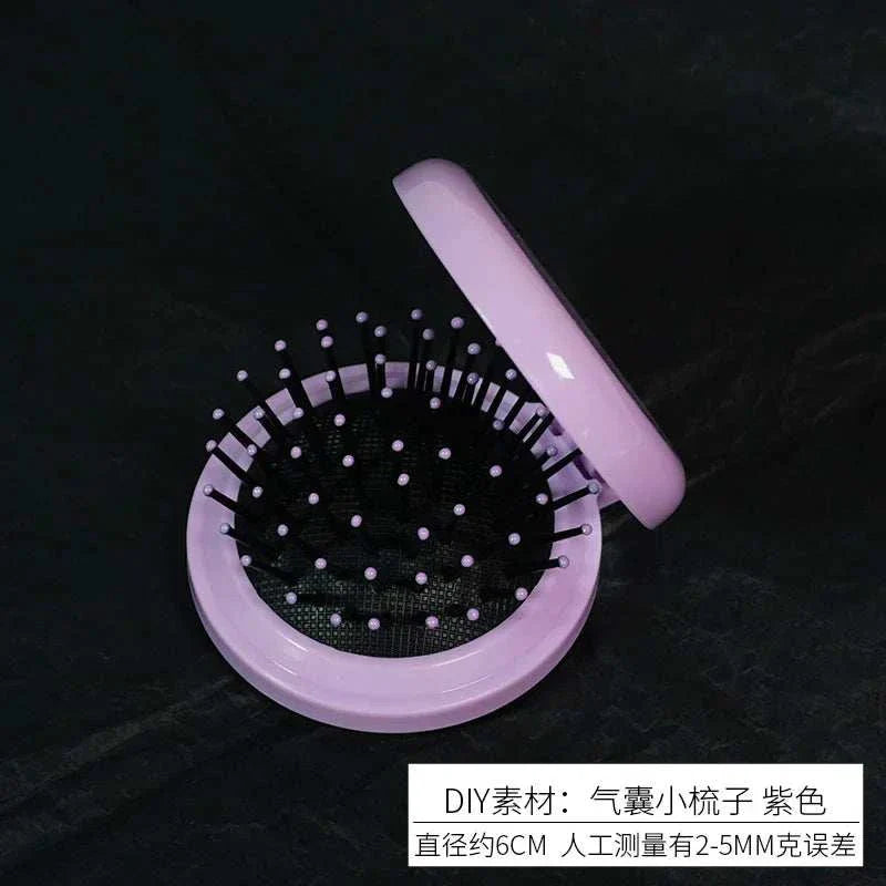 Portable airbag comb mirror with simulation cream glue material for girls' makeup accessories.