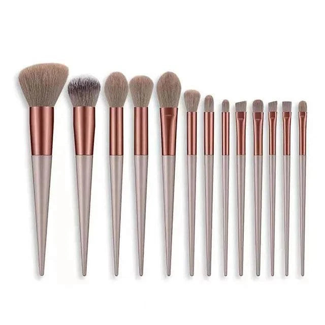 Professional makeup brush set with 13 pieces, including powder, blush, foundation, and concealer brushes.