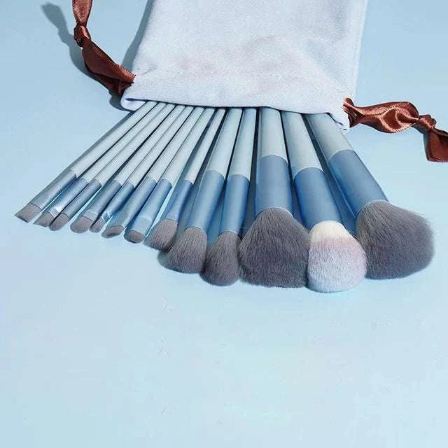 Professional makeup brush set with super soft bristles and plastic handles, including 13 brushes for powders, blush, foundation, concealer, and more, in five colors.