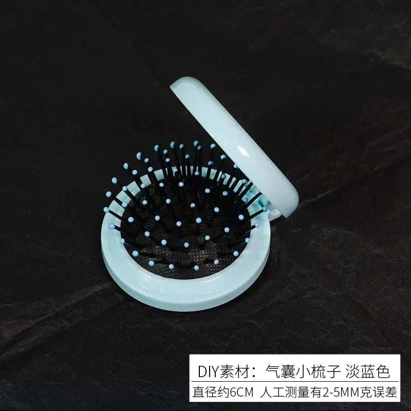 Portable airbag comb mirror with DIY simulation cream glue for girls' makeup.