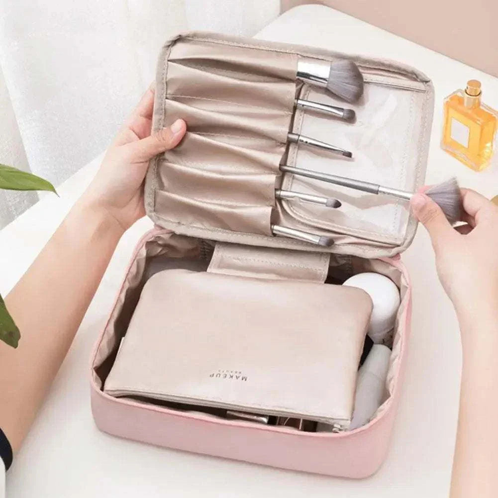 Portable waterproof cosmetic bag for toiletries and makeup storage, high capacity.