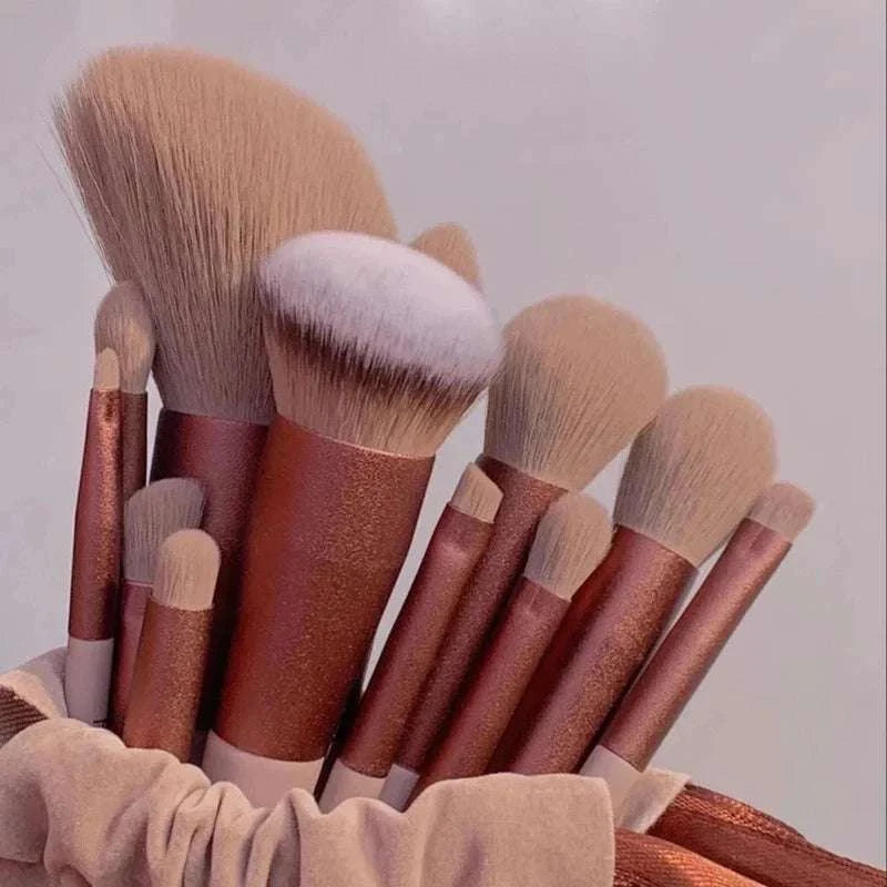 Professional makeup brush set with super soft bristles in various sizes, ideal for powder, blush, foundation, concealer, and eyelashes application.