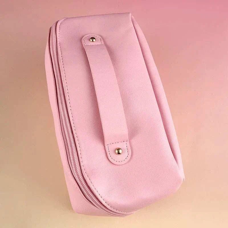 Pink portable cosmetic bag for 27-piece makeup tool set by QIBANHUA, ideal for travel and daily use.