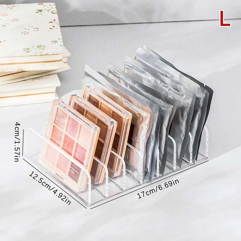 Makeup organizer with 7 compartments for cosmetics and eye shadow tray storage.